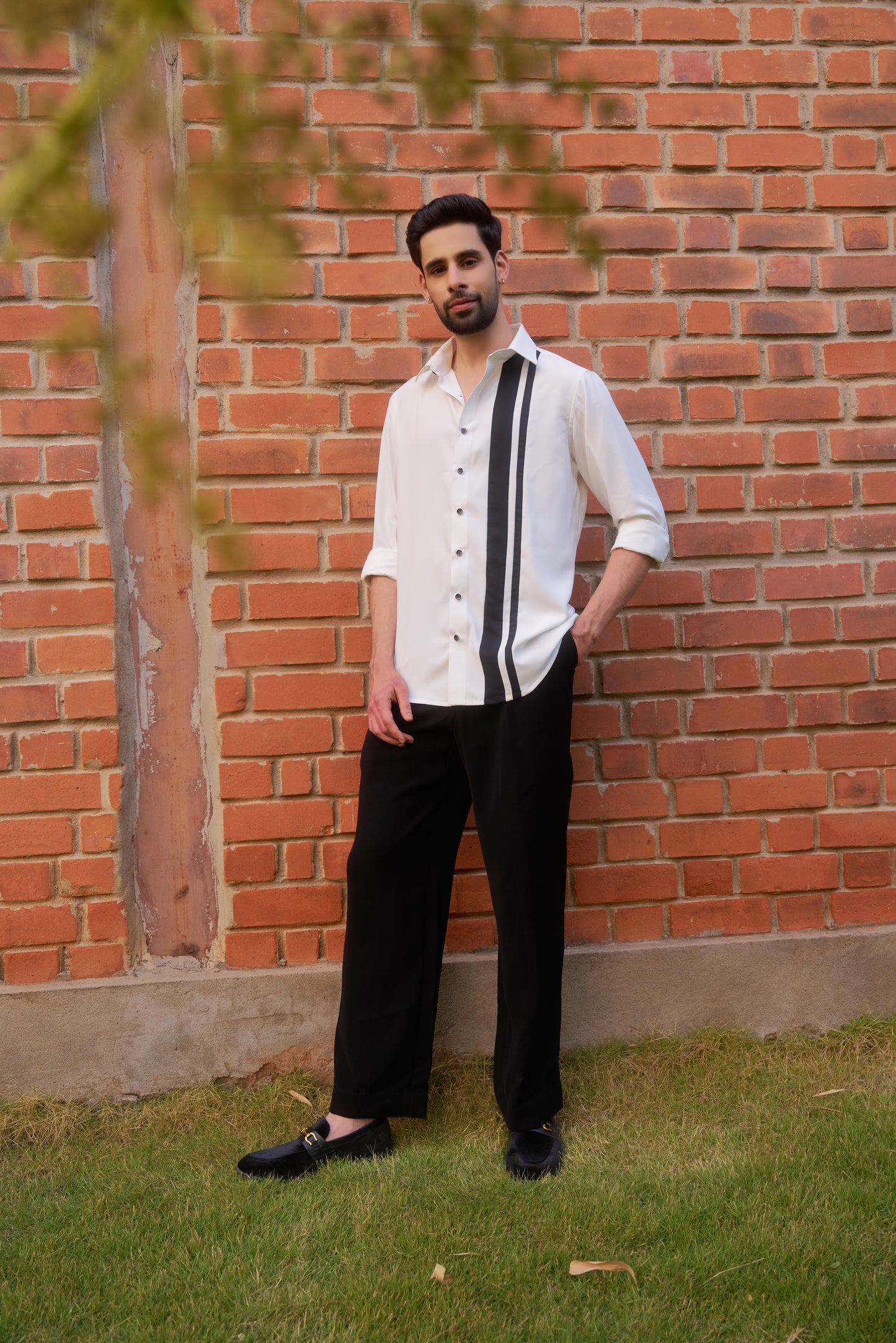 White shirt with black vertical stripes design