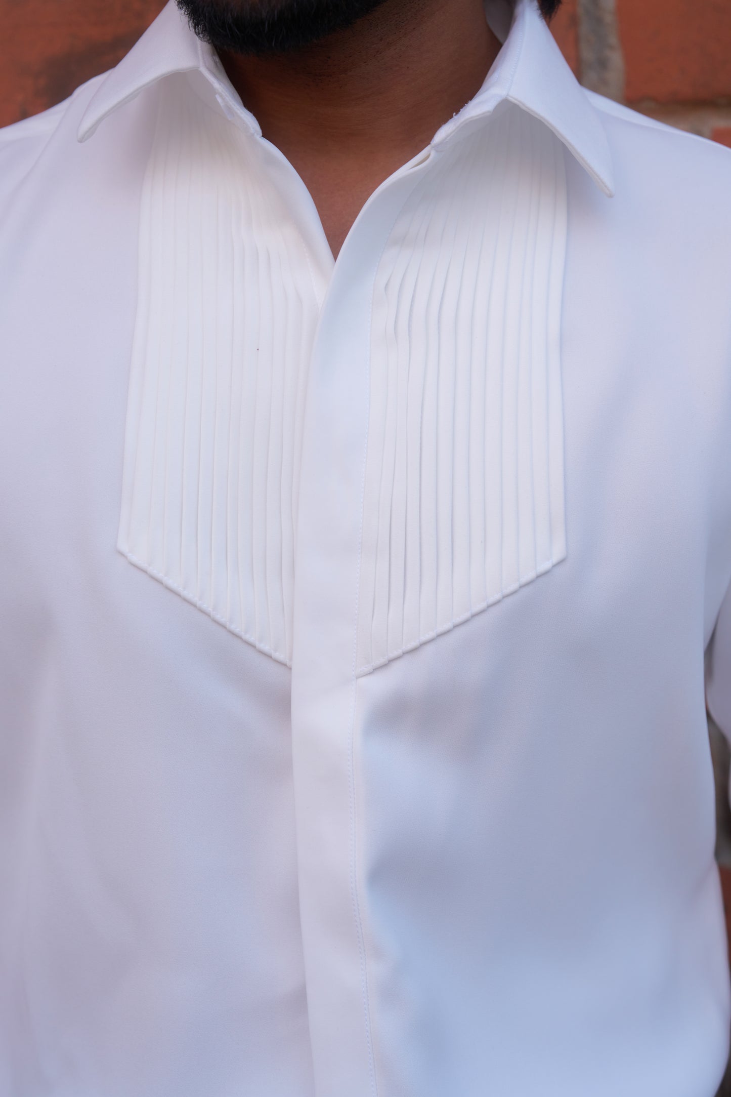 White shirt with tucks design