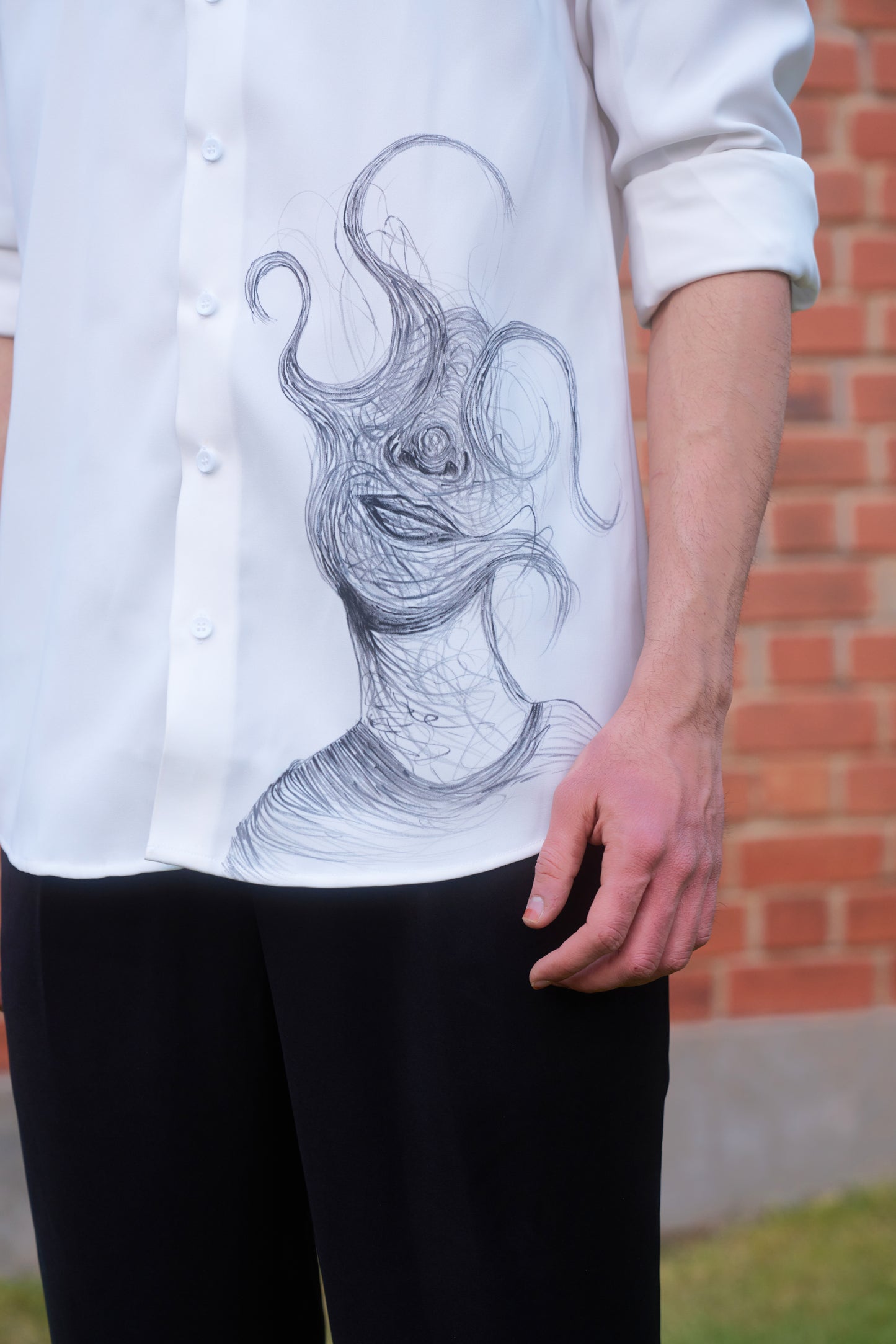 White shirt with face overwhelming hand painted design
