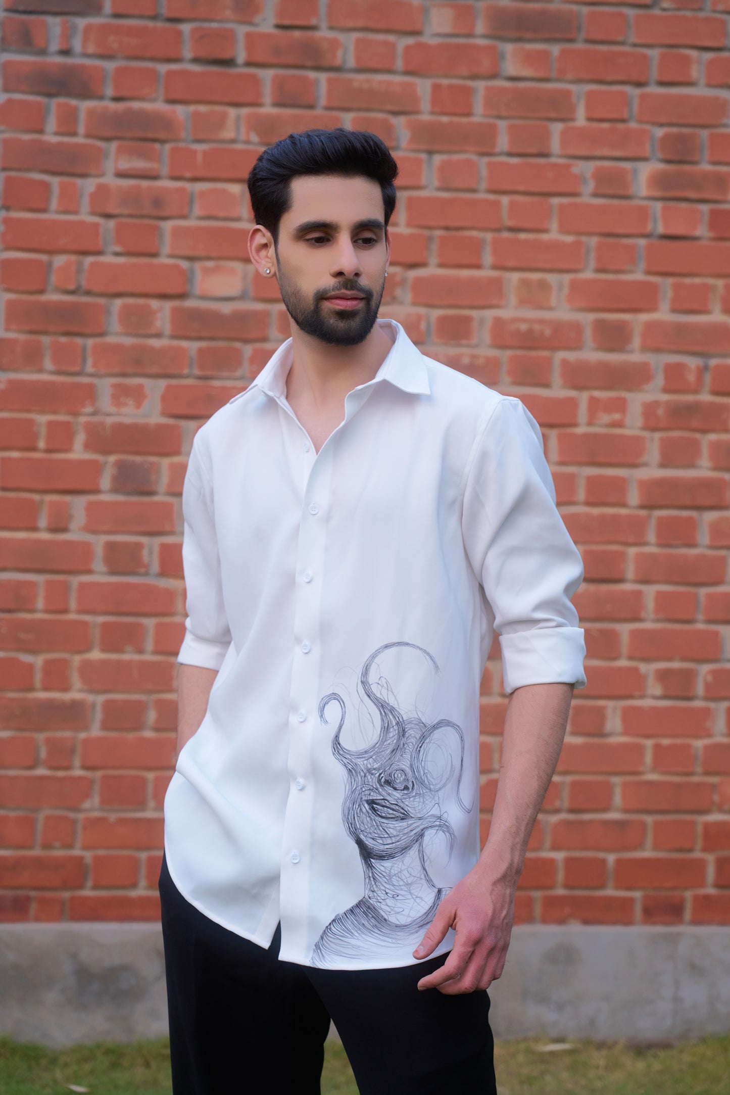 White shirt with face overwhelming hand painted design