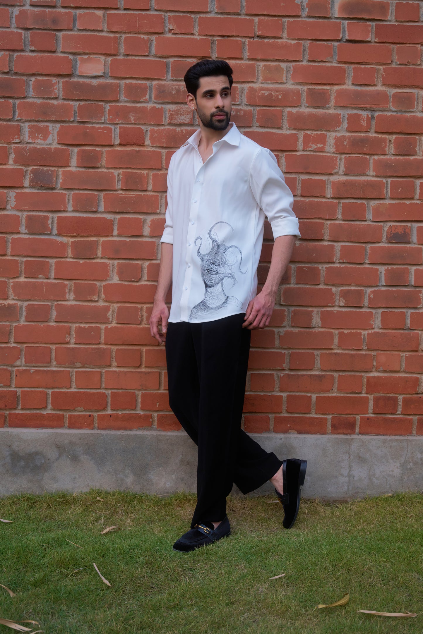 White shirt with face overwhelming hand painted design