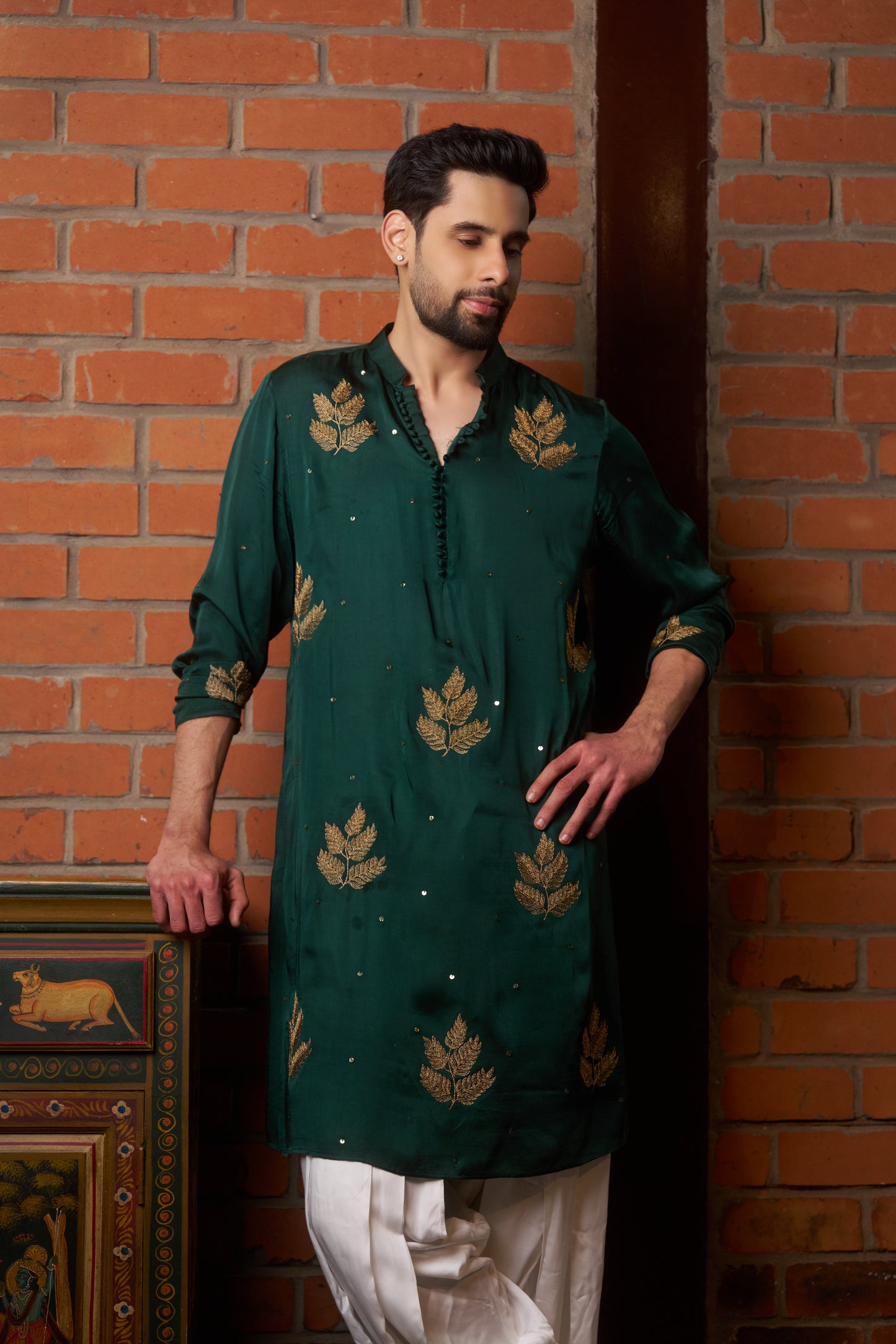 Green traditional kurta with gold leaf embroidery design