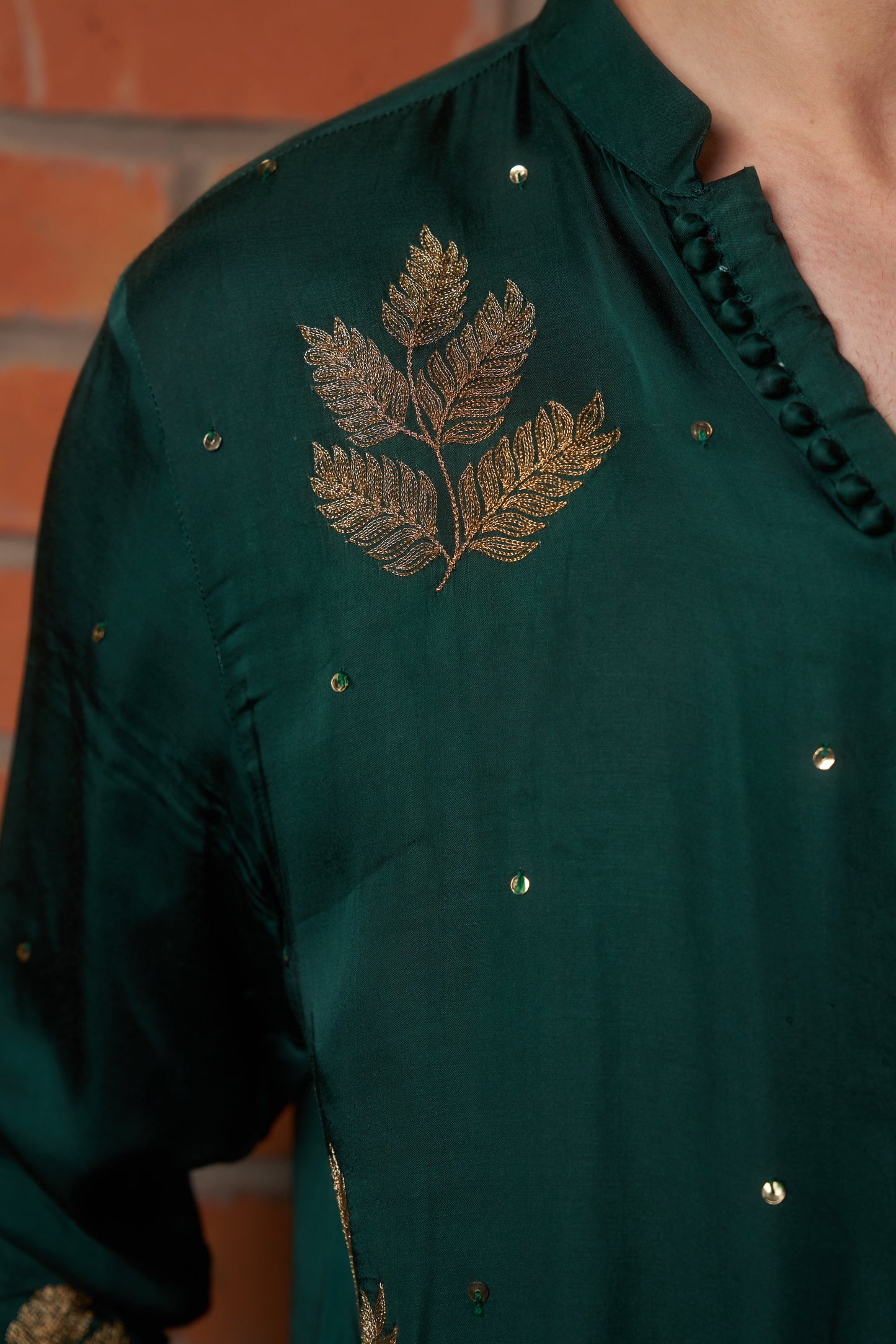 Green traditional kurta with gold leaf embroidery design