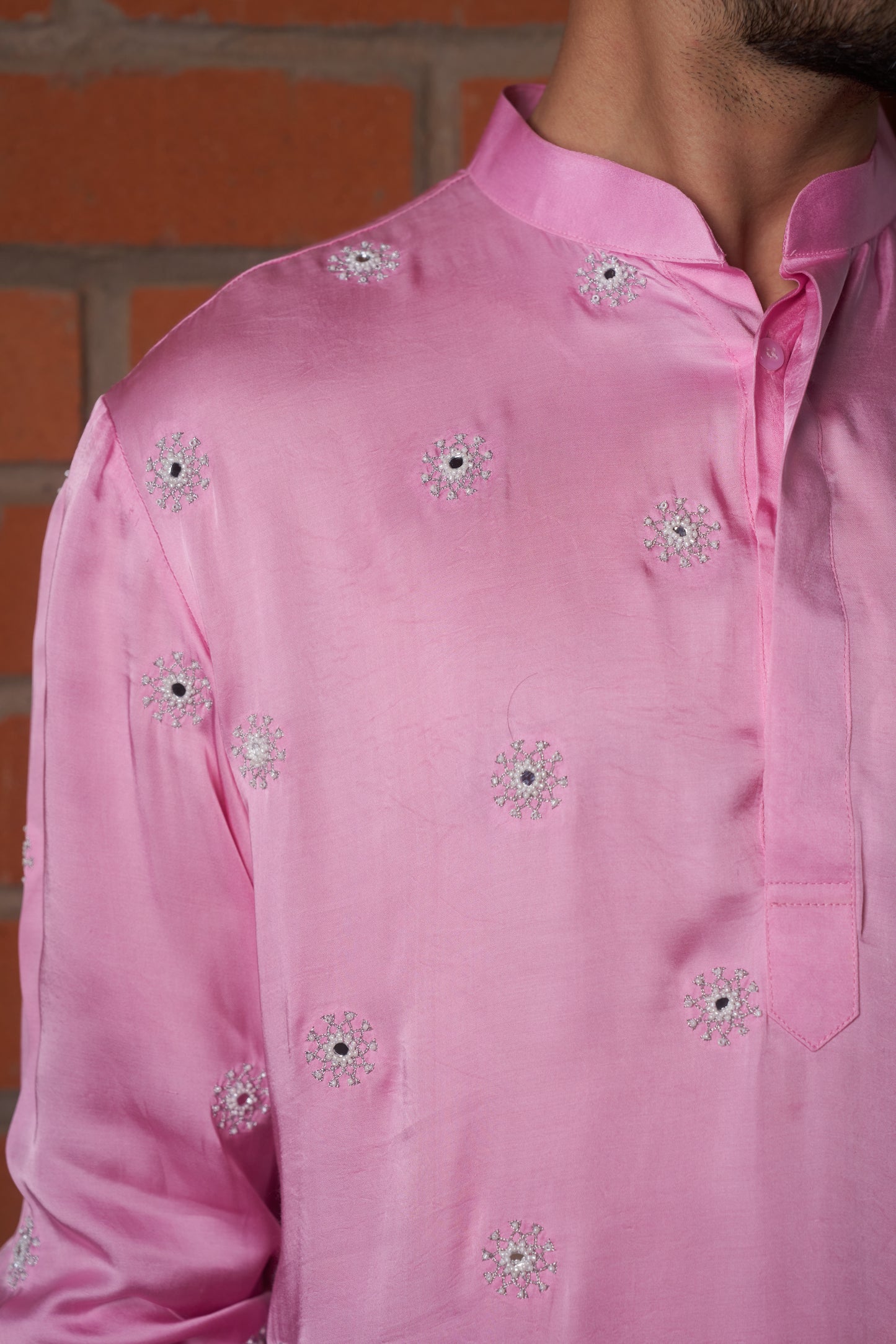 Pink kurta with white hand embroidery one sided design