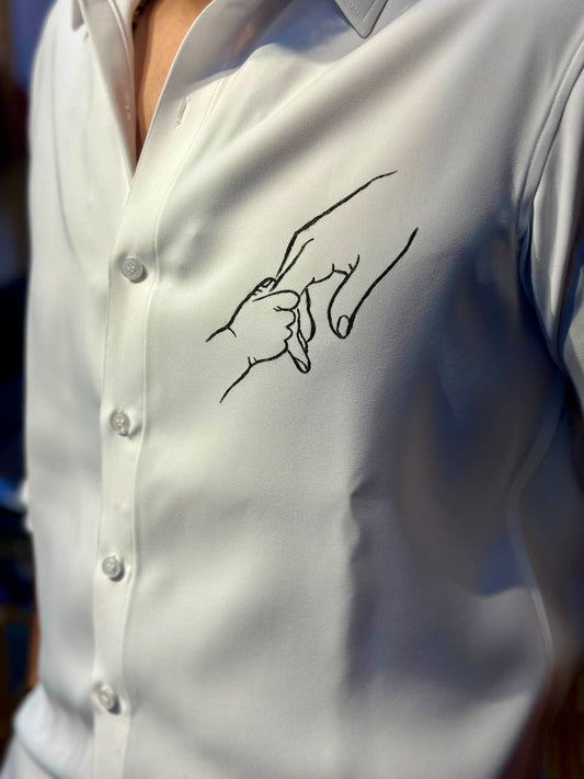 Father-Child holding hands- white shirt